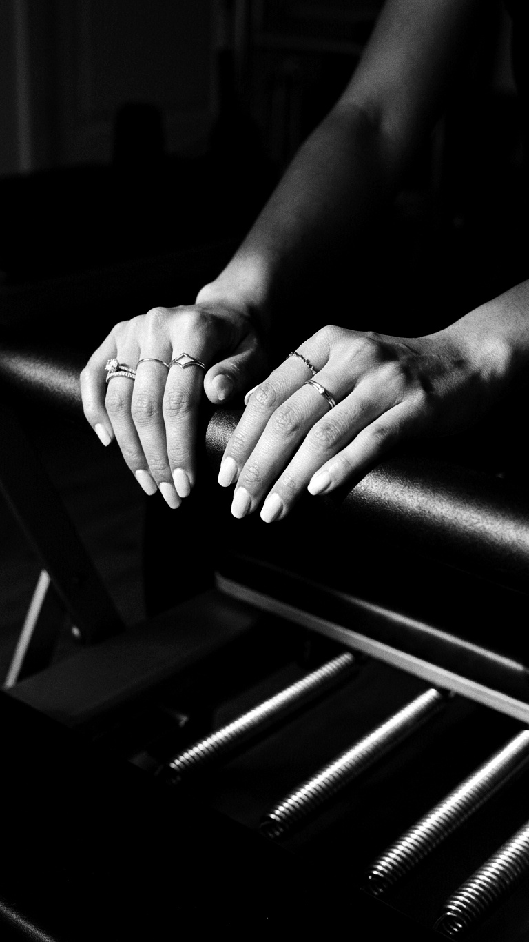 Detail of a hand guiding movement on the reformer