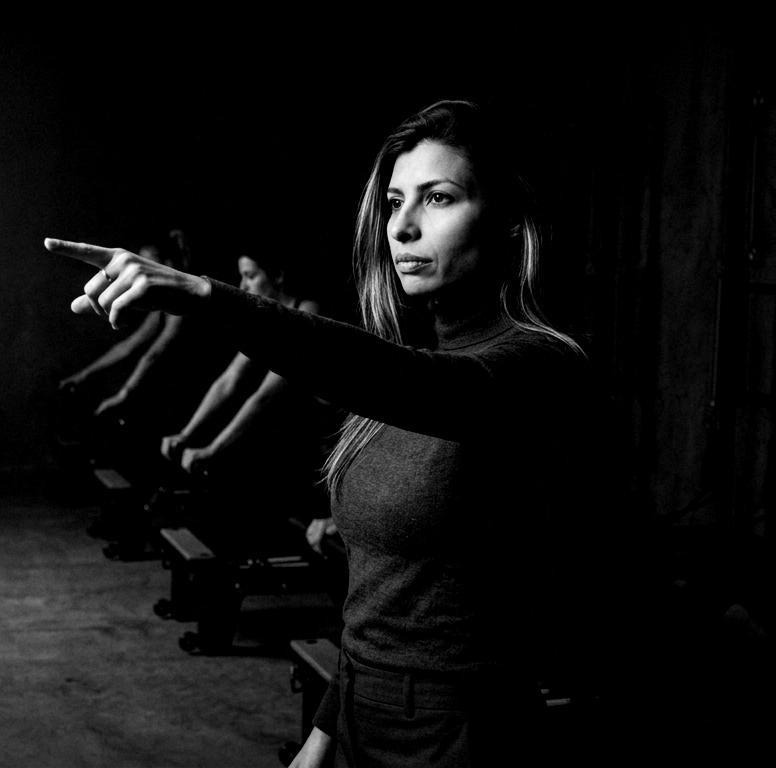 Sana Badhwar commanding a training room, mid-cue